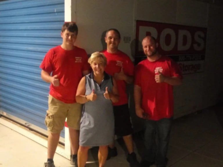 American Moving Labor team with satisfied customer in Columbia SC